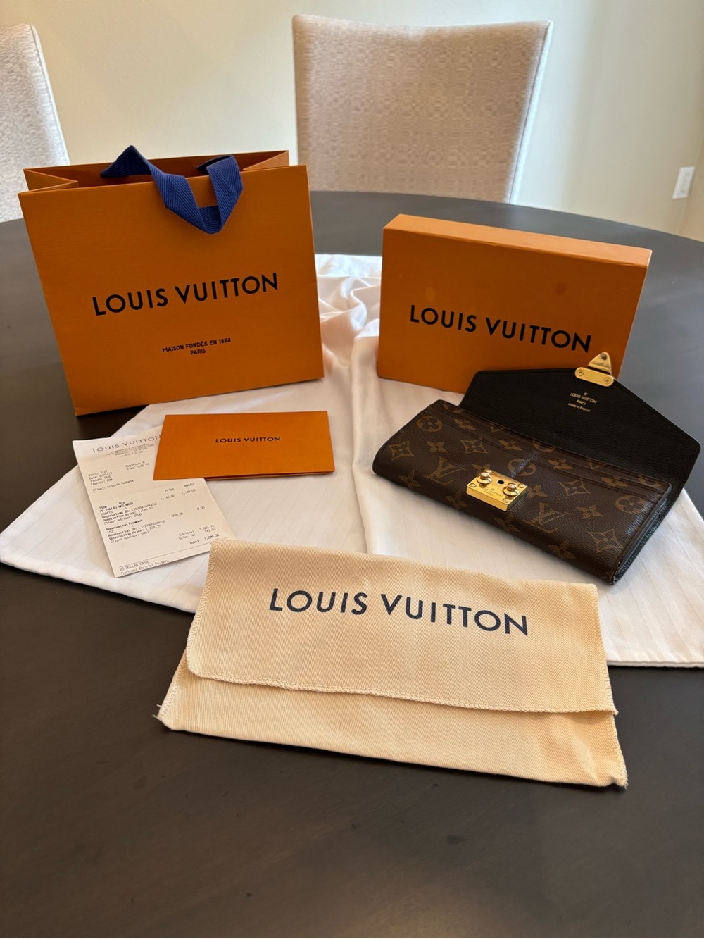 Louis Vuitton Monogram Canvas Wallet with Gold-Tone Lock